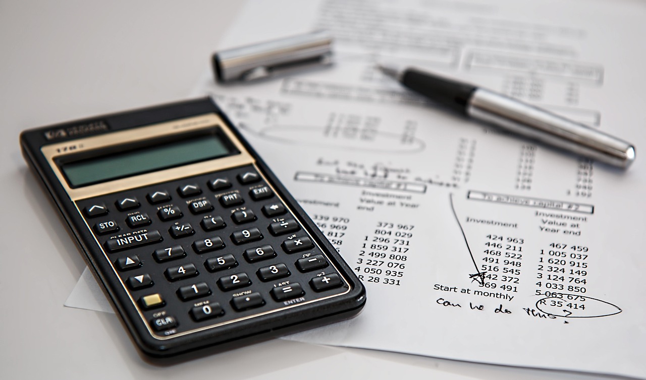 Outsourced accounting team collaborating on financial documents